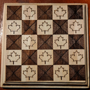 Wood board with a 5 by 5 grid and maple leaf theme